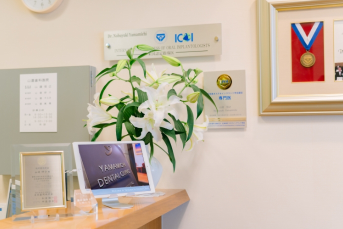 日本歯周病学会認定医による矯正治療